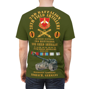 Unisex Cut & Sew Tee (AOP) - C Battery,  2nd Bn 28th Artillery - 210th FA Bde - Ansbach Germany  w M109 w Overseas Cold SVC