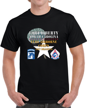 Load image into Gallery viewer, Army - Fort Liberty North Carolina - Xviii Airborne Corps (sky Dragons) - Ssi - Dui W Parachute X 300 T Shirt
